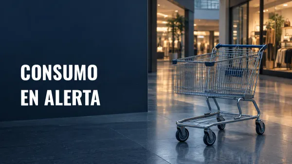 Carrito de compras vacío en un pasillo de tiendas, con el texto Consumo en alerta.