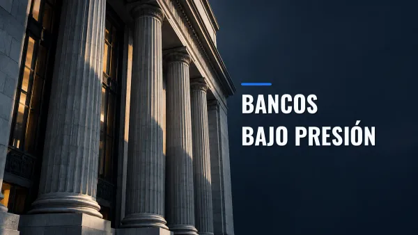 Fachada de un banco con columnas de piedra entre luces y sombras, junto al texto Bancos bajo presión.
